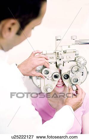 Eye examination View Large Photo Image Stock Photo - Eye examination. Fotosearch