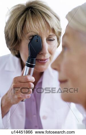 Stock Photograph - Eye examination. Fotosearch