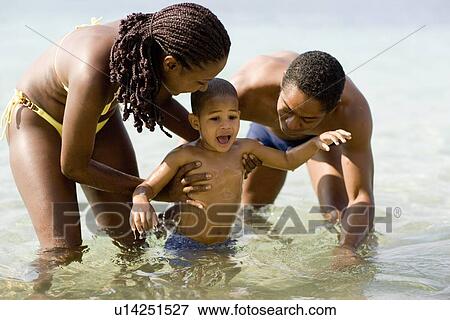 Family playing View Large Photo Image Stock Photo - Family playing. Fotosearch