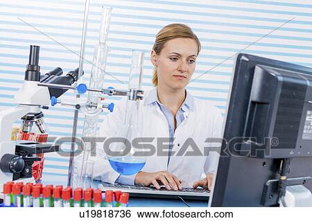 Female chemist using computer in lab View Large Photo Image Stock Photograph - Female chemist using computer in lab. Fotosearch