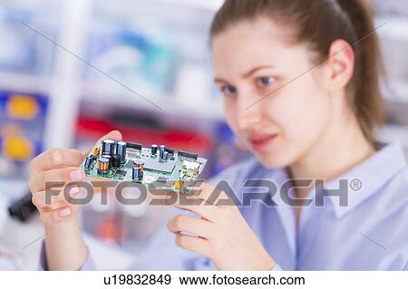 Stock Photo - Female electrical engineer. Fotosearch