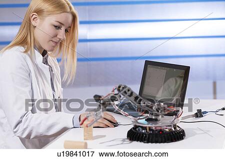 Female electrical engineer with computer View Large Photo Image Stock Photo - Female electrical engineer with computer. Fotosearch