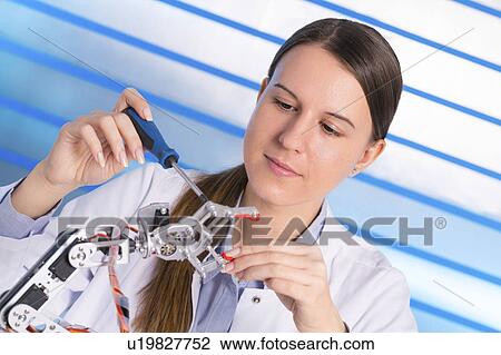 Female electrical engineer working View Large Photo Image Stock Image - Female electrical engineer working. Fotosearch