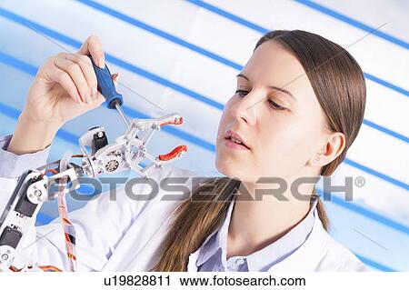 Female electrical engineer working View Large Photo Image Stock Image - Female electrical engineer working. Fotosearch