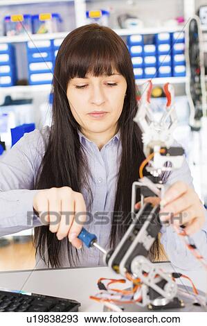 Female electrical engineer working View Large Photo Image Stock Image - Female electrical engineer working. Fotosearch