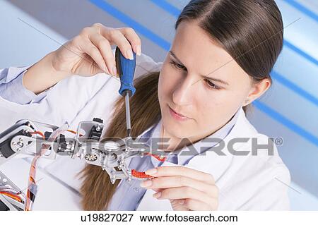 Female electrical engineer working View Large Photo Image Stock Photo - Female electrical engineer working. Fotosearch