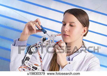Female electrical engineer working View Large Photo Image Stock Photo - Female electrical engineer working. Fotosearch