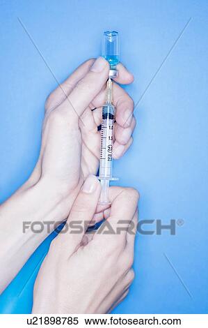 Filling syringe View Large Photo Image Stock Photography - Filling syringe. Fotosearch