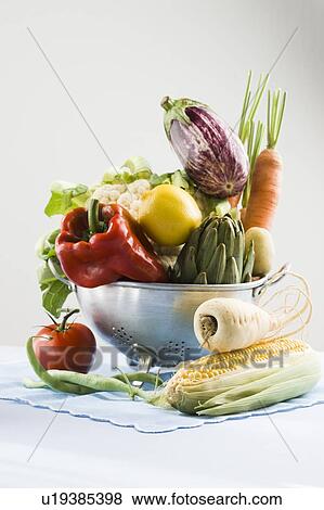 Fresh vegetables in a colander View Large Photo Image Stock Photo - Fresh vegetables in a colander. Fotosearch