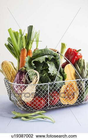 Fresh vegetables in a metal basket View Large Photo Image Stock Image - Fresh vegetables in a metal basket. Fotosearch