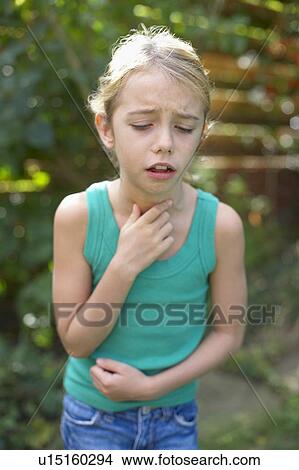 Picture - Girl coughing. Fotosearch