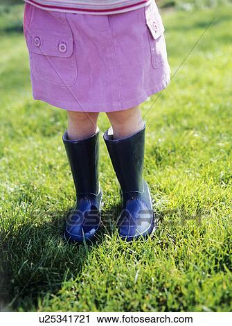 Girl in boots View Large Photo Image Stock Image - Girl in boots. Fotosearch