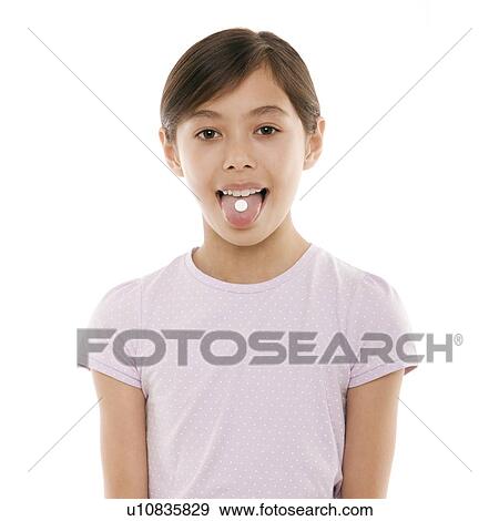 Girl taking painkiller View Large Photo Image Stock Photo - Girl taking painkiller. Fotosearch