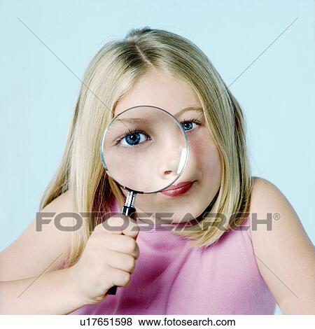 Girl with magnifying glass View Large Photo Image Stock Photo - Girl with magnifying glass. Fotosearch