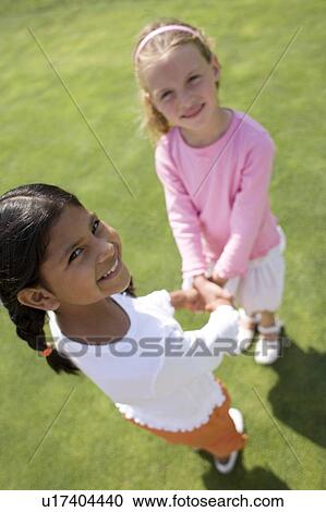 Girls playing View Large Photo Image Stock Image - Girls playing. Fotosearch