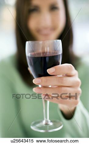 Glass of red wine View Large Photo Image Stock Photography - Glass of red wine. Fotosearch