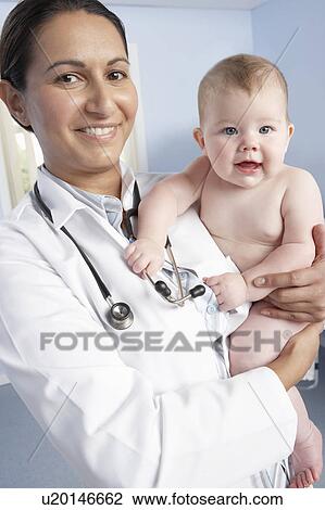 Stock Image - GP and baby. Fotosearch