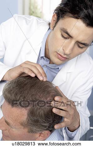 Hair transplant consultation View Large Photo Image Stock Image - Hair transplant consultation. Fotosearch