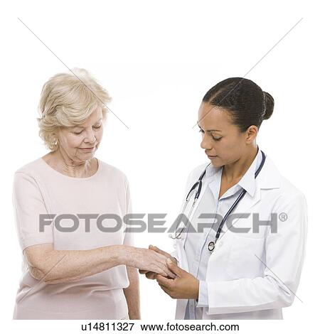 Stock Photo - Hand examination. Fotosearch