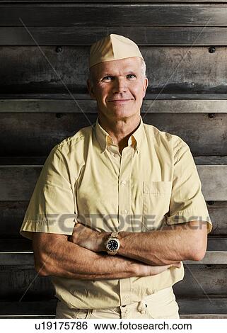 Stock Photograph - Happy baker. Fotosearch