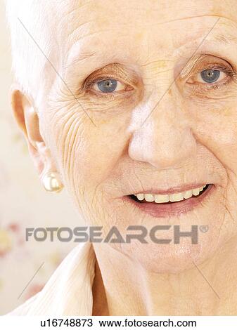 Stock Image - Happy elderly woman. Fotosearch