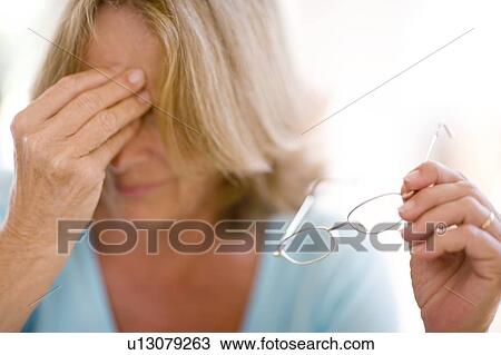 Headache caused by bad eyesight View Large Photo Image Stock Image - Headache caused by bad eyesight. Fotosearch