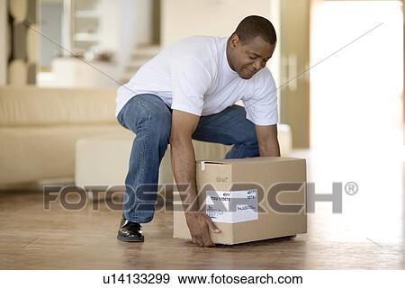 Heavy lifting View Large Photo Image Stock Photo - Heavy lifting. Fotosearch