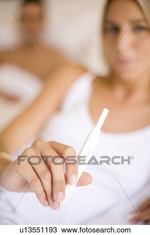Home pregnancy testing View Large Photo Image Stock Image - Home pregnancy testing. Fotosearch