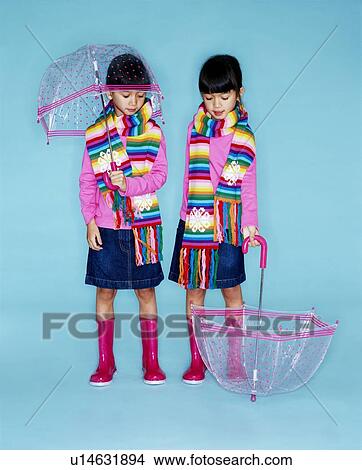 Identical twin sisters View Large Photo Image Picture - Identical twin sisters. Fotosearch