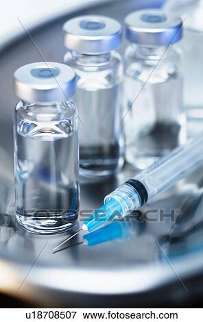 Injectable medications. Kidney dish with injectable medications in sealed vials and a disposable plastic medical syringe View Large Photo Image Stock Photo - Injectable medications. Kidney dish with injectable medications in sealed vials and a disposable plastic medical syringe. Fotosearch