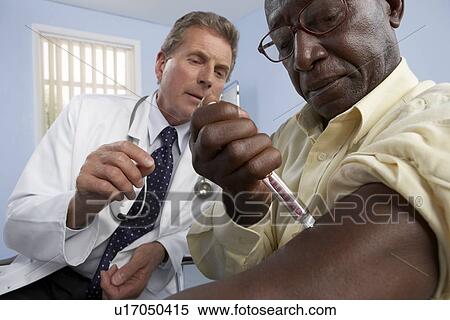 Stock Photography - Injecting insulin. Fotosearch