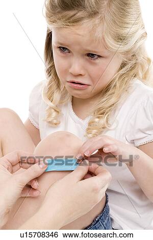 Stock Photograph - Injured girl. Fotosearch