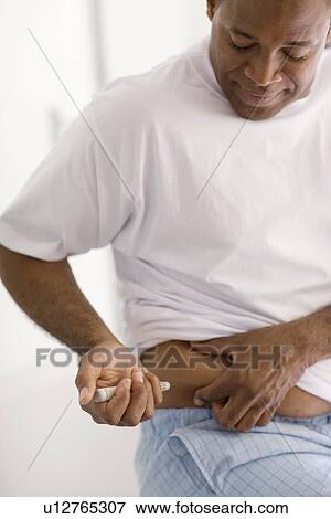 Insulin injection View Large Photo Image Stock Photo - Insulin injection. Fotosearch