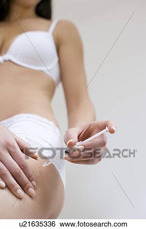 Stock Photograph - Insulin injection. Fotosearch