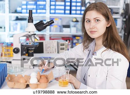 Lab technician testing eggs in lab View Large Photo Image Stock Photo - Lab technician testing eggs in lab. Fotosearch