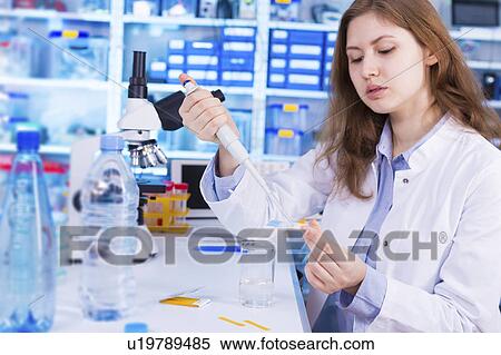 Lab technician testing water in lab View Large Photo Image Stock Photography - Lab technician testing water in lab. Fotosearch