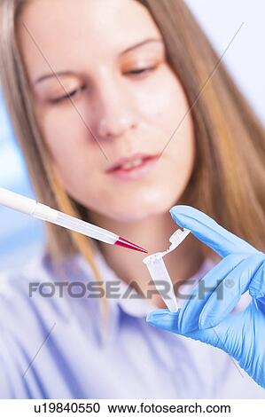 Lab technician using pipette View Large Photo Image Stock Image - Lab technician using pipette. Fotosearch