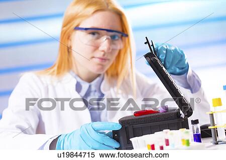 Lab technician with hazardous substances View Large Photo Image Stock Photography - Lab technician with hazardous substances. Fotosearch