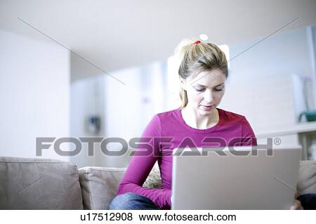 Laptop use View Large Photo Image Stock Photo - Laptop use. Fotosearch