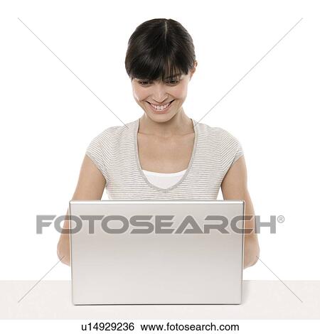 Laptop use View Large Photo Image Stock Photograph - Laptop use. Fotosearch