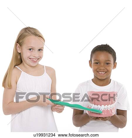 Learning dental hygiene View Large Photo Image Picture - Learning dental hygiene. Fotosearch