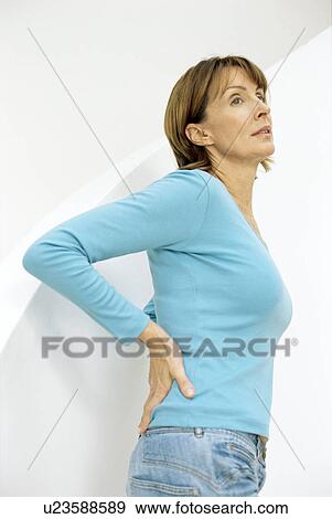 Stock Photo - Lower back pain. Fotosearch