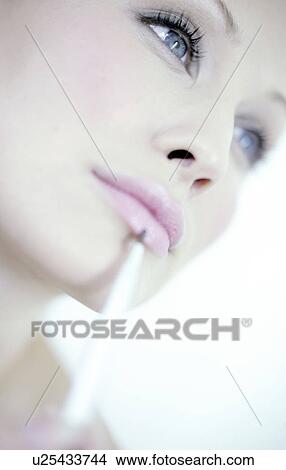 Picture - Make-up application. Fotosearch