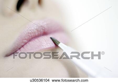 Picture - Make-up application. Fotosearch