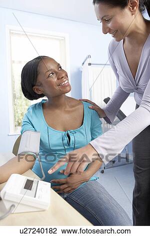 Measuring blood pressure in pregnancy View Large Photo Image Stock Image - Measuring blood pressure in pregnancy. Fotosearch