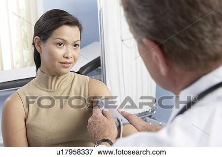 Stock Photo - Measuring blood pressure. Fotosearch
