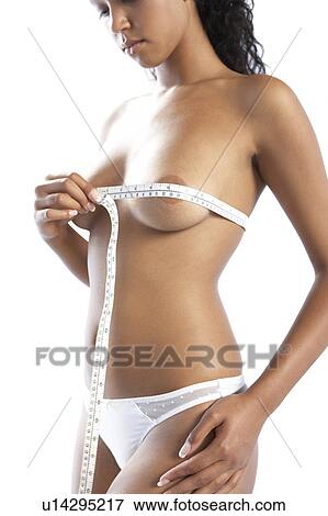 Stock Photo - Measuring bra size. Fotosearch