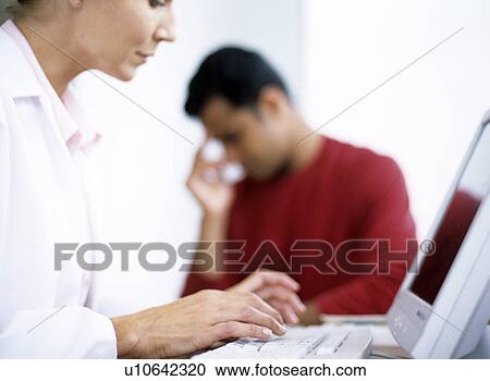 Stock Image - Medical consultation. Fotosearch