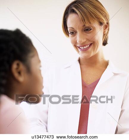 Stock Image - Medical consultation. Fotosearch