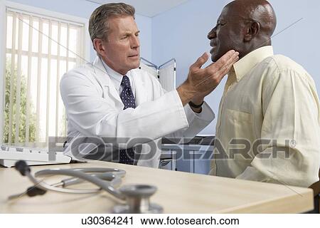 Stock Image - Medical consultation. Fotosearch